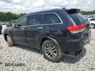2017 Jeep Grand Cherokee Limited with VIN 1C4RJEBG9HC837822, listed as a Copart auction lot 57498835 with 140,179 mi miles and Salvage title. Bid and sale history available at DreamBid. Image 2.