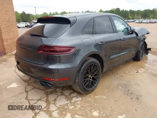 2017 Porsche Macan GTS with VIN WP1AG2A53HLB50635, listed as a IAAI auction lot 41665310 with 100,730 mi miles. Bid and sale history available at carsss.com. Image 4.