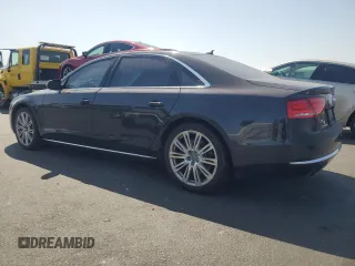 2011 Audi A8 z VIN WAURVAFD0BN005579, wystawiony jako Copart lot #59584025 z przebiegiem 95 704 mil mil oraz Szkoda całkowita • Salvage title. Historia ofert i sprzedaży dostępna na DreamBid. Obrazek 2.