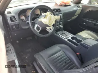 2012 Dodge Challenger SXT Plus z VIN 2C3CDYAGXCH127824, wystawiony jako Copart lot #55026435 z przebiegiem Nie podano mil oraz Szkoda całkowita • Salvage title. Historia ofert i sprzedaży dostępna na DreamBid. Obrazek 8.