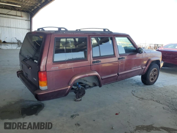 2000 Jeep Cherokee Classic with VIN 1J4FF58S8YL135534, listed as a Copart auction lot 62211335 with 108,888 mi miles and Salvage title. Bid and sale history available at DreamBid. Image 3.