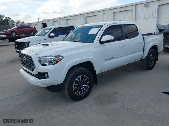 2023 Toyota Tacoma 4WD SR with VIN 3TMCZ5AN9PM566739, listed as a IAAI auction lot 41513763 with 16,708 mi miles. Bid and sale history available at carsss.com. Image 2.