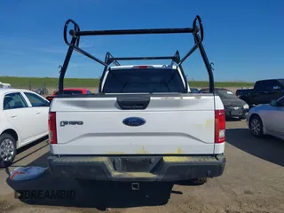 2017 Ford F-150 XL with VIN 1FTEX1CG2HKC93299, listed as a IAAI auction lot 41675673 with 101,726 mi miles. Bid and sale history available at carsss.com. Image 16.