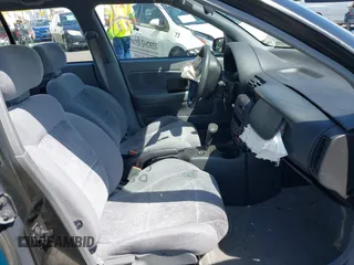 1995 Saturn SL with VIN 1G8ZK5277SZ320711, listed as a IAAI auction lot 42115543 with 77,558 mi miles and . Bid and sale history available at DreamBid. Image 5.