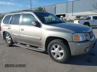 2002 GMC Envoy SLT z VIN 1GKDT13S122304915, wystawiony jako IAAI lot #40081086 z przebiegiem 247 513 mil mil oraz . Historia ofert i sprzedaży dostępna na DreamBid. Obrazek 1.