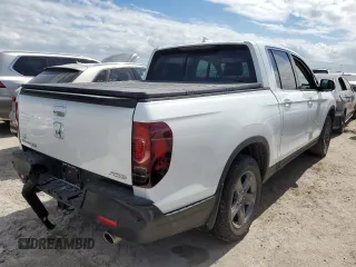 2021 Honda Ridgeline RTL-E with VIN 5FPYK3F78MB005044, listed as a Copart auction lot 63120882 with Not provided miles and . Bid and sale history available at DreamBid. Image 4.