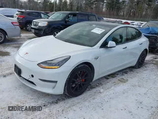 2020 Tesla Model 3 Standard Range Plus with VIN 5YJ3E1EA7LF742973, listed as a IAAI auction lot 41409285 with 48,993 mi miles and . Bid and sale history available at DreamBid. Image 17.