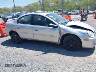 2004 Dodge Neon SXT z VIN 1B3ES56C44D580657, wystawiony jako IAAI lot #42137299 z przebiegiem 138 918 mil mil oraz . Historia ofert i sprzedaży dostępna na DreamBid. Obrazek 13.