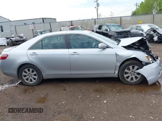 2007 Toyota Camry LE with VIN 4T1BK46K27U037911, listed as a IAAI auction lot 42158405 with 247,722 mi miles and . Bid and sale history available at DreamBid. Image 13.