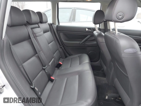 2005 Volkswagen Passat z VIN WVWCD63B55E132974, wystawiony jako IAAI lot #41755346 z przebiegiem 68 295 mil mil oraz . Historia ofert i sprzedaży dostępna na DreamBid. Obrazek 8.