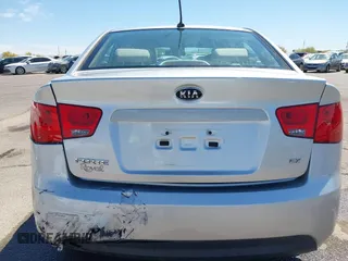 2010 Kia Forte EX with VIN KNAFU4A29A5195670, listed as a IAAI auction lot 42075961 with 160,648 mi miles. Bid and sale history available at carsss.com. Image 16.