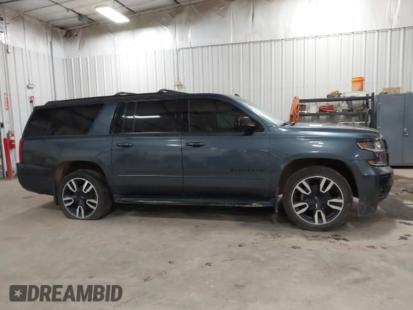 2019 Chevrolet Suburban Premier with VIN 1GNSKJKJ8KR169252, listed as a IAAI auction lot 41472231 with 95,266 mi miles and . Bid and sale history available at DreamBid. Image 13.