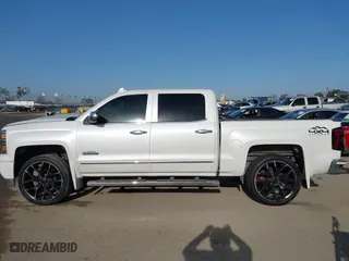 2015 Chevrolet Silverado 1500 High Country with VIN 3GCUKTEC6FG204564, listed as a IAAI auction lot 41953511 with 130,341 mi miles. Bid and sale history available at carsss.com. Image 14.