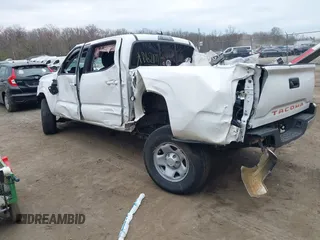 2022 Toyota Tacoma SR with VIN 3TYAX5GN3NT062077, listed as a IAAI auction lot 41886531 with 58,687 mi miles and . Bid and sale history available at DreamBid. Image 3.