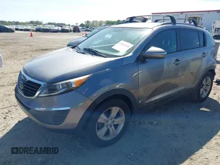 2013 Kia Sportage LX with VIN KNDPB3A21D7486860, listed as a IAAI auction lot 42049450 with 177,059 mi miles and . Bid and sale history available at DreamBid. Image 2.