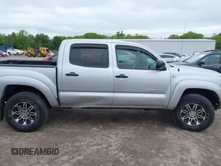 2011 Toyota Tacoma with VIN 3TMLU4EN4BM069898, listed as a IAAI auction lot 42371500 with 201,538 mi miles and . Bid and sale history available at DreamBid. Image 14.