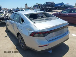2024 Honda Accord EX with VIN 1HGCY1F38RA055253, listed as a IAAI auction lot 42510898 with 20,801 mi miles and . Bid and sale history available at DreamBid. Image 3.