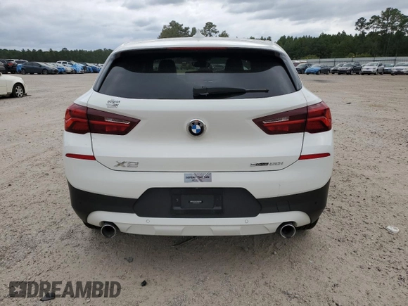 2022 BMW X2 sDrive28i with VIN WBXYH9C0XN5T46405, listed as a Copart auction lot 70291554 with 28,035 mi miles and Salvage Title. Bid and sale history available at carsss.com. Image 6.