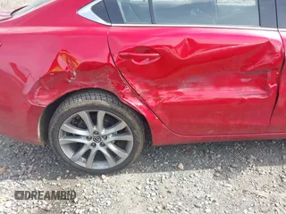 2017 Mazda Mazda6 Touring with VIN JM1GL1V56H1146909, listed as a IAAI auction lot 41709510 with 110,341 mi miles. Bid and sale history available at carsss.com. Image 6.