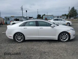 2015 Lincoln MKZ Hybrid with VIN 3LN6L2LUXFR606809, listed as a IAAI auction lot 41976918 with 169,999 mi miles and . Bid and sale history available at DreamBid. Image 14.