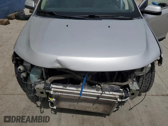 2013 Ford Edge Limited z VIN 2FMDK4KC3DBA75902, wystawiony jako Copart lot #58465245 z przebiegiem 219 934 mil mil oraz Szkoda całkowita • Salvage title. Historia ofert i sprzedaży dostępna na DreamBid. Obrazek 12.