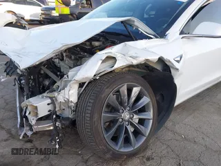 2020 Tesla Model 3 Performance with VIN 5YJ3E1EC1LF602516, listed as a IAAI auction lot 41841216 with 28,967 mi miles and . Bid and sale history available at DreamBid. Image 20.