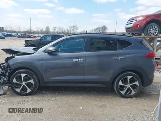2016 Hyundai Tucson Eco with VIN KM8J3CA2XGU103017, listed as a IAAI auction lot 41897807 with 95,722 mi miles. Bid and sale history available at carsss.com. Image 14.