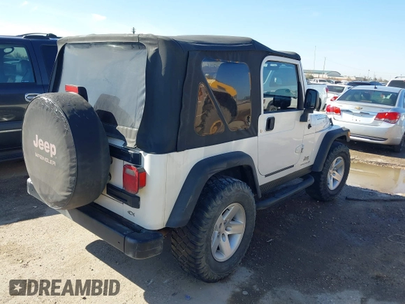 2005 Jeep Wrangler SE with VIN 1J4FA29S95P363770, listed as a IAAI auction lot 41362056 with 140,540 mi miles. Bid and sale history available at carsss.com. Image 4.