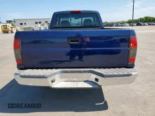 1999 Nissan Frontier XE with VIN 1N6DD26S9XC307893, listed as a Copart auction lot 66045605 with 239,269 mi miles and Salvage title. Bid and sale history available at DreamBid. Image 6.
