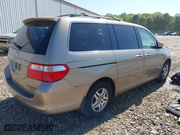 2006 Honda Odyssey EX-L with VIN 5FNRL38666B410188, listed as a IAAI auction lot 42004957 with 156,584 mi miles. Bid and sale history available at carsss.com. Image 4.