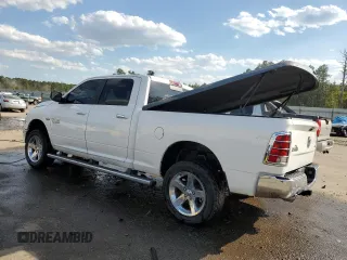 2018 Ram 1500 Outdoorsman with VIN 1C6RR7TT4JS177868, listed as a Copart auction lot 50699295 with 124,974 mi miles and Salvage title. Bid and sale history available at DreamBid. Image 2.