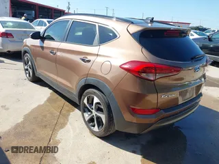 2016 Hyundai Tucson Limited with VIN KM8J33A25GU074798, listed as a IAAI auction lot 42103566 with 143,777 mi miles and . Bid and sale history available at carsss.com. Image 3.