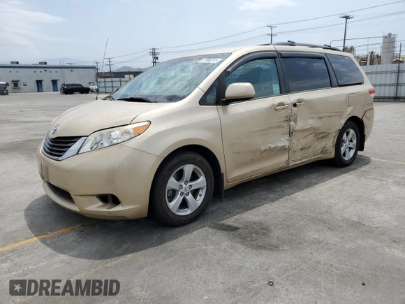 2012 Toyota Sienna LE AAS with VIN 5TDKK3DC5CS227808, listed as a Copart auction lot 57984515 with 103,656 mi miles and Salvage title. Bid and sale history available at DreamBid. Image 1.
