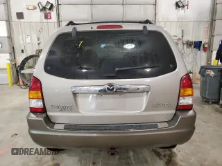 2001 Mazda Tribute LX with VIN 4F2CU08101KM05943, listed as a Copart auction lot 84077694 with 137,937 mi miles and Salvage Title. Bid and sale history available at DreamBid. Image 6.