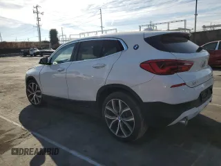 2020 BMW X2 xDrive28i with VIN WBXYJ1C02L5P85780, listed as a Copart auction lot 43665555 with 14,451 mi miles and Salvage Title. Bid and sale history available at carsss.com. Image 2.