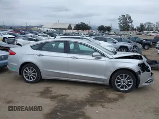 2017 Ford Fusion Energi SE with VIN 3FA6P0PU9HR354096, listed as a IAAI auction lot 42064703 with 69,601 mi miles. Bid and sale history available at carsss.com. Image 13.