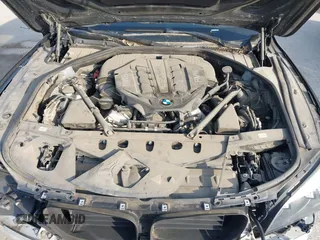 2013 BMW 7 Series 750i with VIN WBAYA8C59DC996552, listed as a IAAI auction lot 41921201 with 99,188 mi miles and . Bid and sale history available at DreamBid. Image 10.