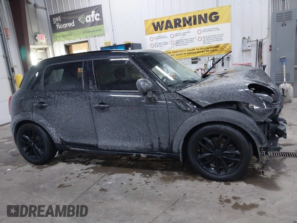 2016 MINI Countryman S z VIN WMWZC5C55GWU00739, wystawiony jako IAAI lot #41333148 z przebiegiem 74 259 mil mil oraz . Historia ofert i sprzedaży dostępna na DreamBid. Obrazek 14.