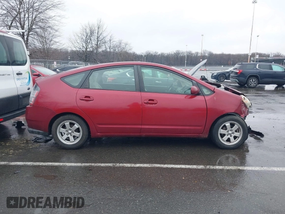 2005 Toyota Prius z VIN JTDKB20U257055663, wystawiony jako IAAI lot #41580381 z przebiegiem 123 032 mil mil oraz . Historia ofert i sprzedaży dostępna na DreamBid. Obrazek 13.