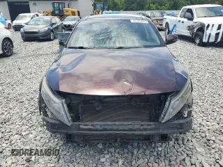 2015 Kia Optima EX with VIN 5XXGN4A71FG409750, listed as a Copart auction lot 64105865 with 313,992 mi miles and Salvage title. Bid and sale history available at DreamBid. Image 5.