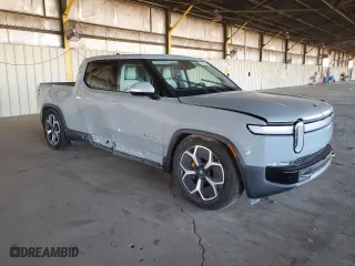 2022 Rivian R1T Adventure Package with VIN 7FCTGAAA3NN014291, listed as a Copart auction lot 76587044 with 0 mi miles and Salvage Title. Bid and sale history available at carsss.com. Image 4.