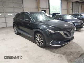 2016 Mazda CX-9 Signature with VIN JM3TCBEY5G0111286, listed as a IAAI auction lot 42018161 with 155,920 mi miles and . Bid and sale history available at DreamBid. Image 1.