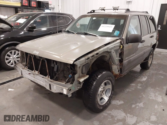 1997 Jeep Grand Cherokee Laredo with VIN 1J4GZ58S2VC746778, listed as a IAAI auction lot 41225925 with 196,679 mi miles. Bid and sale history available at carsss.com. Image 6.