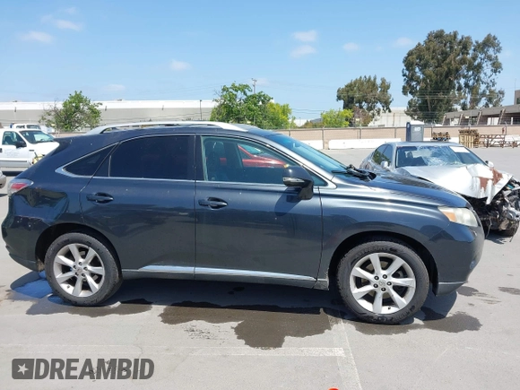 2010 Lexus RX 350 with VIN 2T2BK1BA8AC061209, listed as a IAAI auction lot 42105424 with 242,961 mi miles. Bid and sale history available at carsss.com. Image 13.