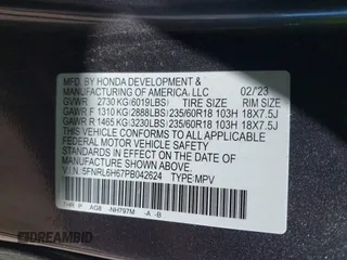 2023 Honda Odyssey EX-L with VIN 5FNRL6H67PB042624, listed as a IAAI auction lot 41763044 with 76,700 mi miles. Bid and sale history available at carsss.com. Image 9.