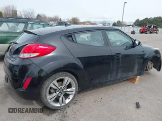 2013 Hyundai Veloster w/Black Int with VIN KMHTC6AD8DU155575, listed as a IAAI auction lot 41722849 with 100,204 mi miles and . Bid and sale history available at DreamBid. Image 4.