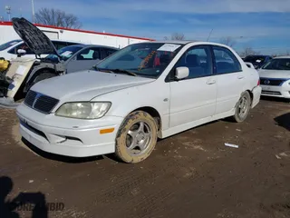 2003 Mitsubishi Lancer OZ-Rally with VIN JA3AJ86E13U100350, listed as a IAAI auction lot 41584874 with 244,945 mi miles. Bid and sale history available at carsss.com. Image 2.