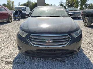 2013 Ford Taurus SEL with VIN 1FAHP2H8XDG229163, listed as a Copart auction lot 71637534 with 120,525 mi miles and Clean Title. Bid and sale history available at DreamBid. Image 5.