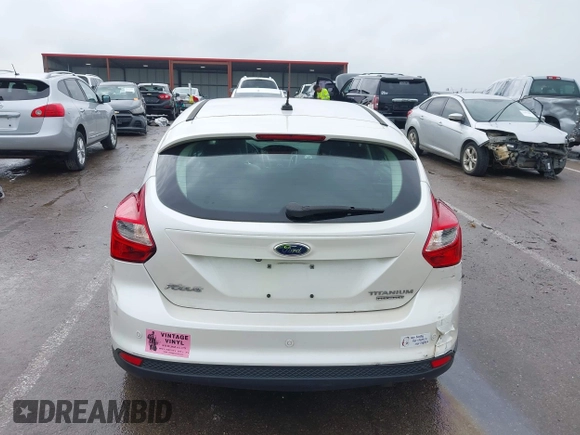2014 Ford Focus Titanium with VIN 1FADP3N24EL184220, listed as a IAAI auction lot 42429610 with 172,575 mi miles and . Bid and sale history available at DreamBid. Image 17.