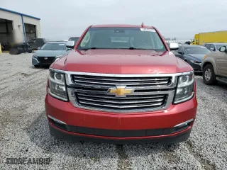 2015 Chevrolet Tahoe LTZ with VIN 1GNSKCKCXFR723104, listed as a Copart auction lot 50660325 with 198,740 mi miles and Salvage Title. Bid and sale history available at carsss.com. Image 5.